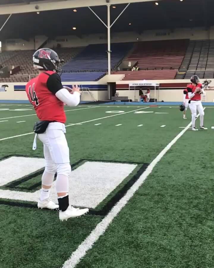 North Medford’s QB Josh Robinson warming up...