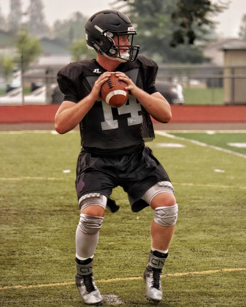 Black Tornado Senior QB Josh Robbins getting...